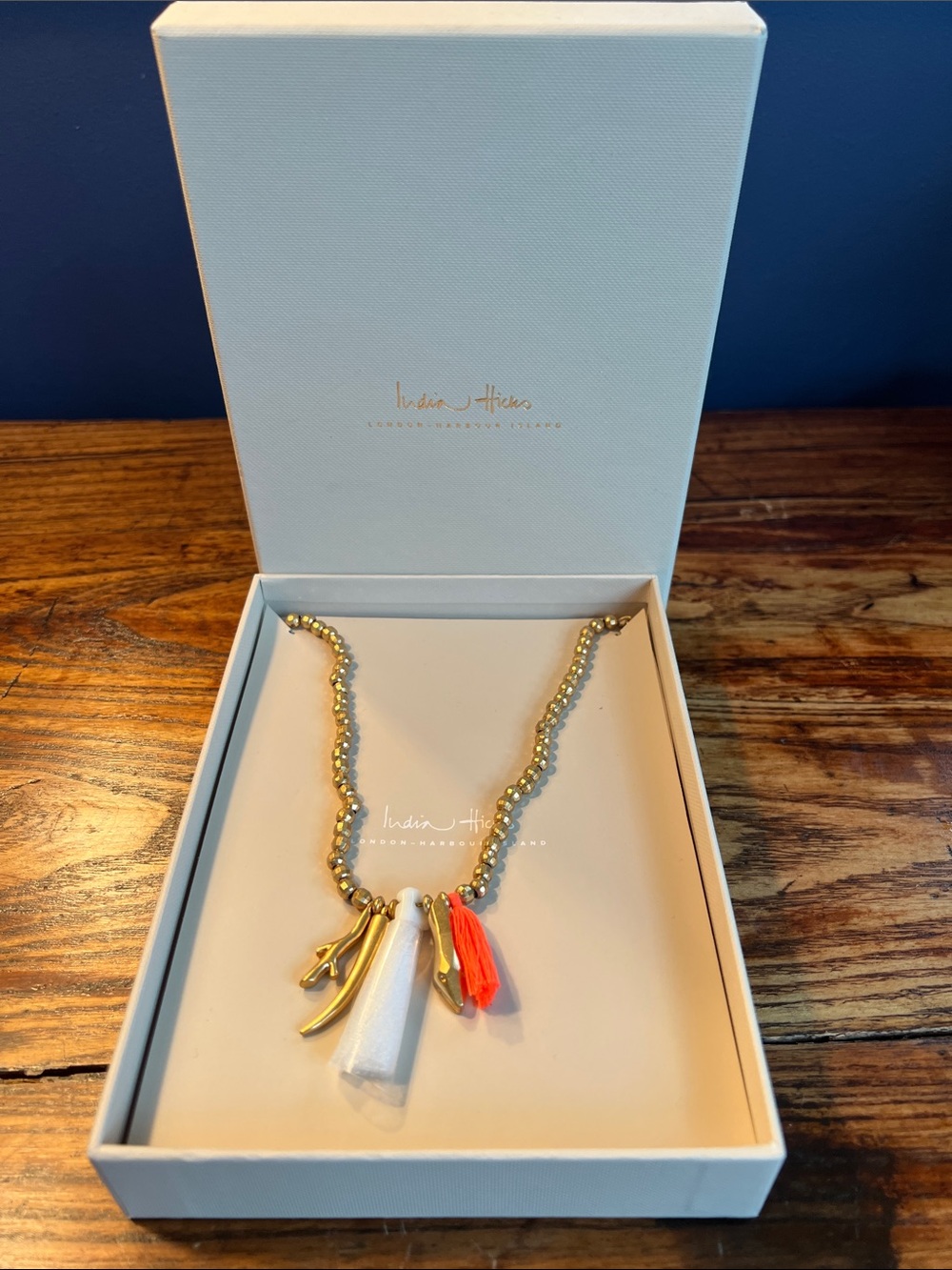 India Hicks Gold Beaded BOHO Necklace with white coral and orange Tassels